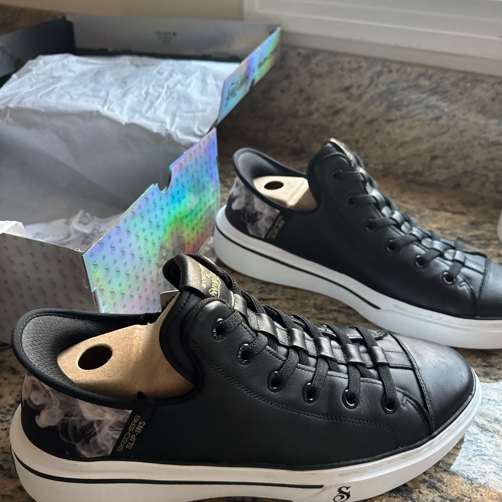 Black Sneakers with White Sole and Unique Design